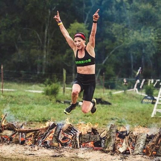 Jessica Sheppard doing a fire jump in VJ Shoes MAXx